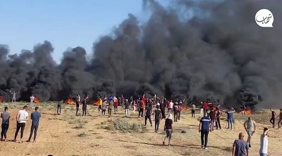 gaza rioters burn tires