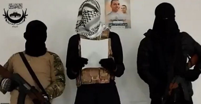 The Video released by the organization. In the background is the Egyptian Soldier that shot and killed IDF soldiers earlier in 2023 | Source: https://www.watanserb.com