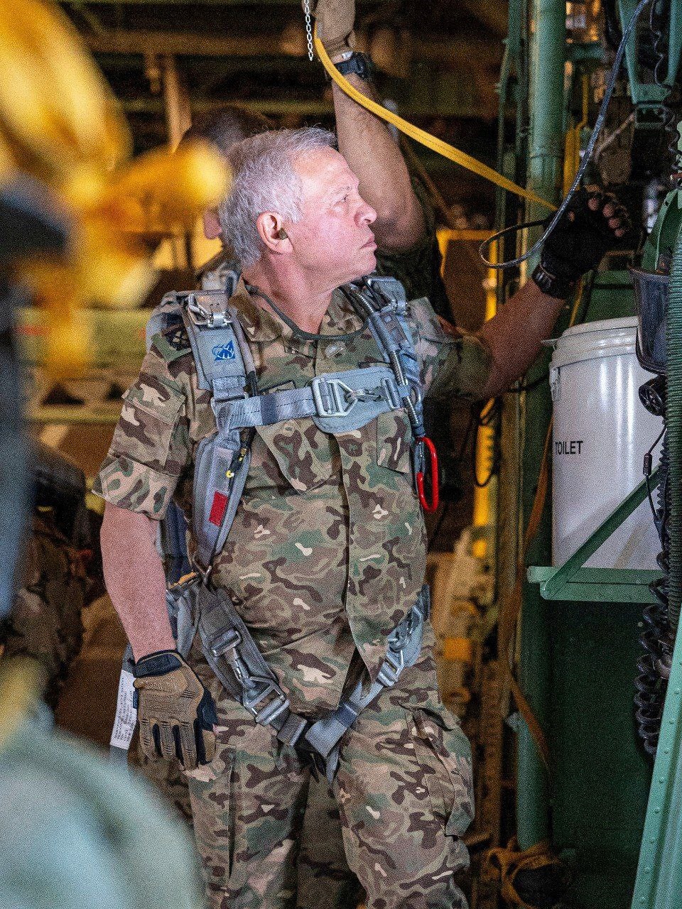 Abdullah King of Jordan participating in the airborne distribution of humanitarian aid to Gaz
