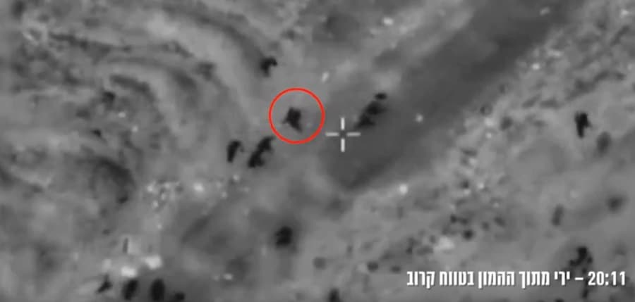drone footage of armed hamas terrorists near humanitarian aid