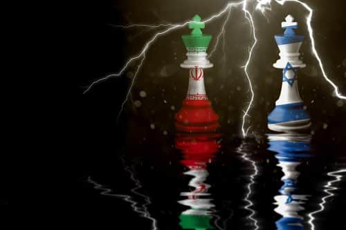 two chess kings colored in Israel and Iran flag colors on black background and a lightning strike between