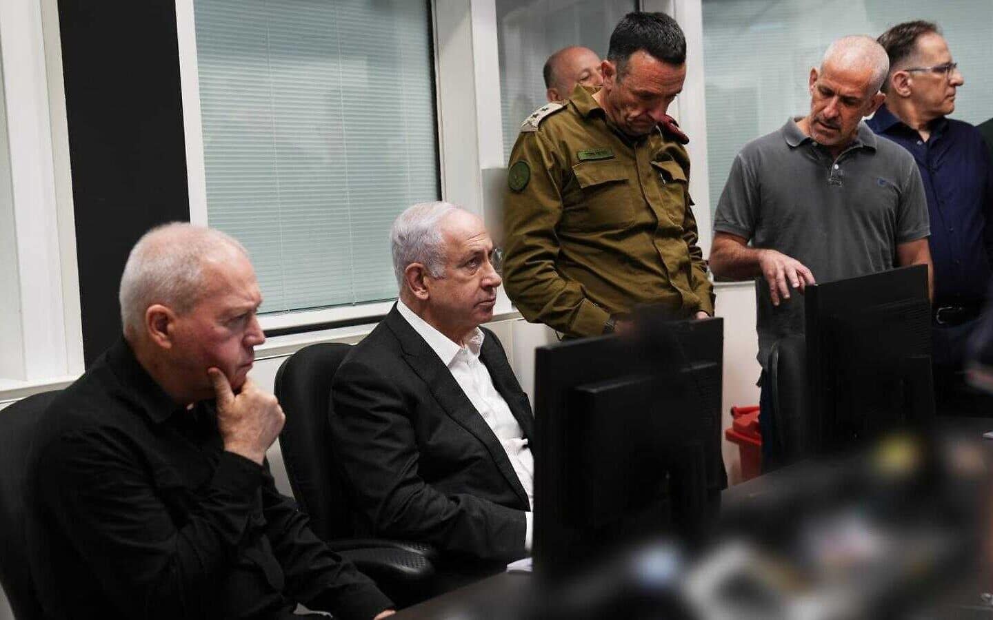 Defense Minister Yoav Gallant, Prime Minister Benjamin Netanyahu, IDF Chief of Staff Herzi Halevi and Shin Bet security services Director Ronen Bar at the special operations room overseeing a mission to release hostages in the Gaza Strip