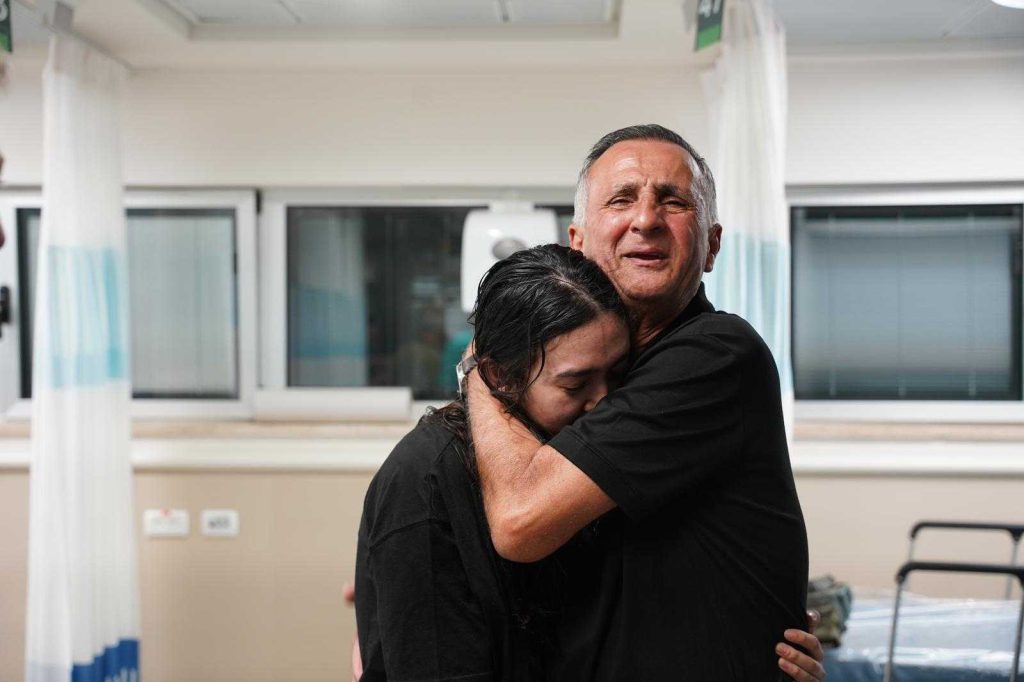 Freed hostage, Noa Argamani, is embraced by her father, Yaakov, at Sheba Medical Center after being rescued