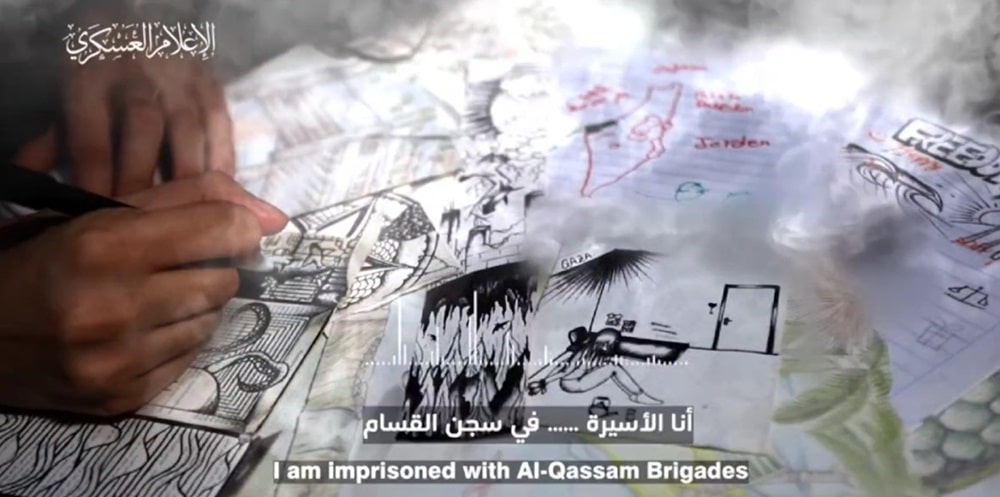 photo from Hamas video with subtitles 'I am imprisoned with Al-Qassam Brigades'