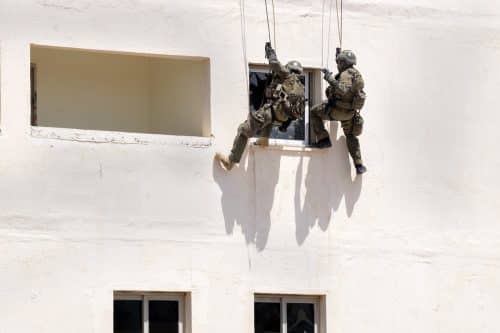 soldiers entering through window