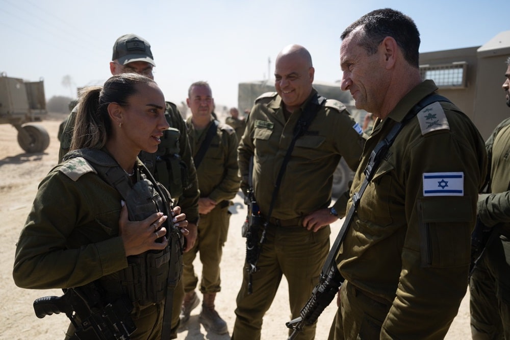 Herzi Halevi speaking with female soldier