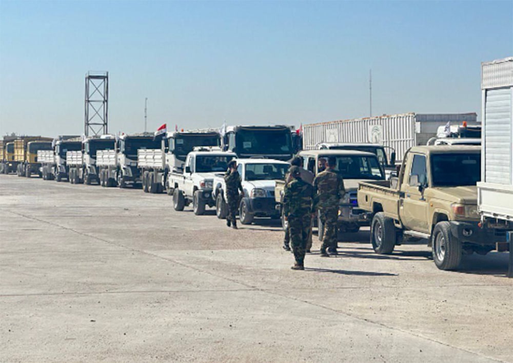 long line of trucks and motorcycles