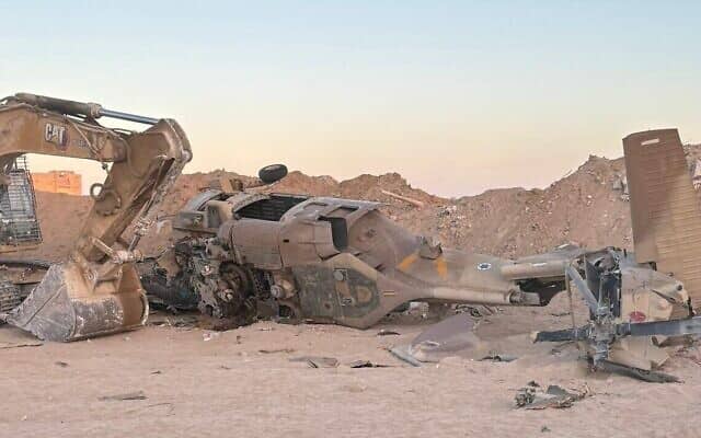 crashed helicopter and an excavator