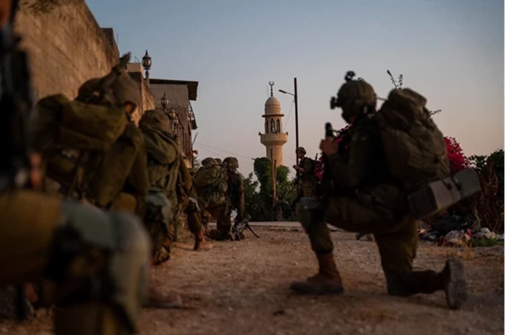 IDF soldiers in front of mosque