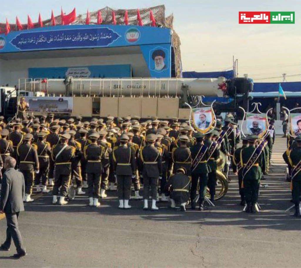 iranian army soldiers observing large missile