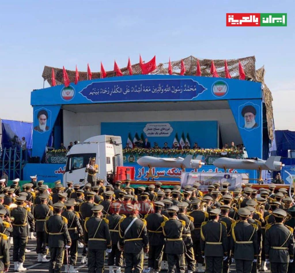 iranian army soldiers observing missiles presentation