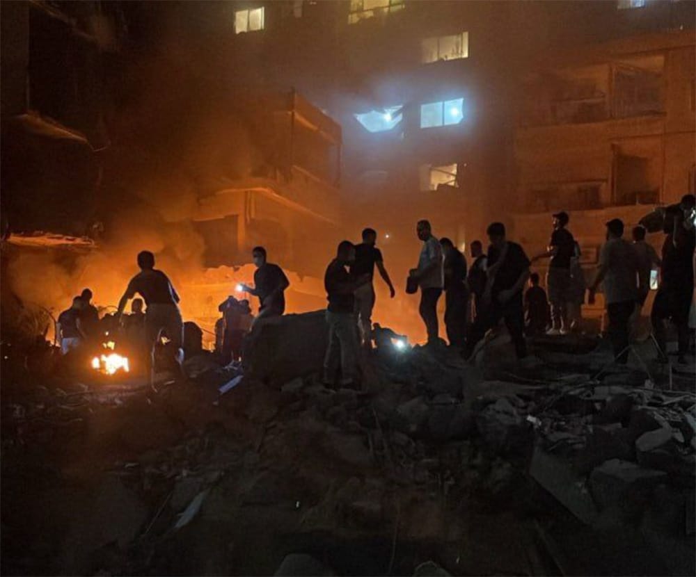 citizens in attack site at night