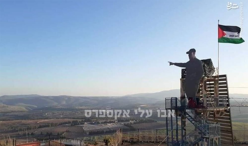 Qasam Soleimani statue and flag on Hezbollah post