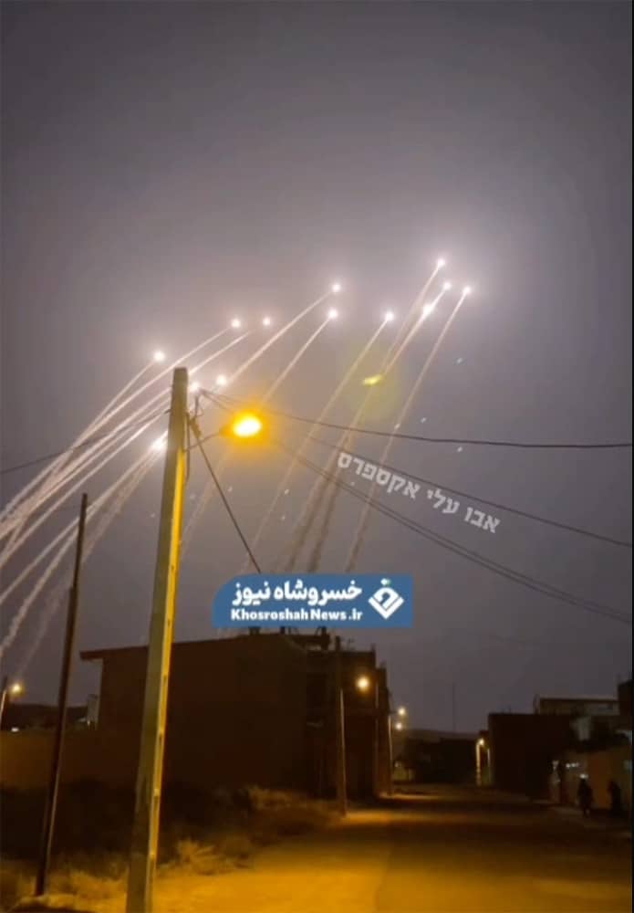 missiles shot and lighting the night sky