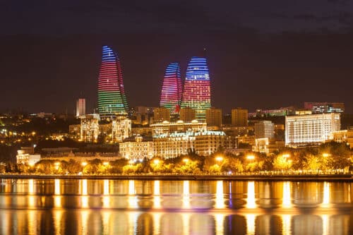 flame towers lit in Azerbaijan flag colors