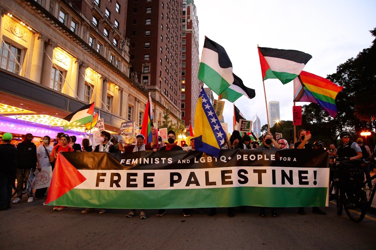 protestors with sign 'feminists & LGBTQ people for a Free Palestine