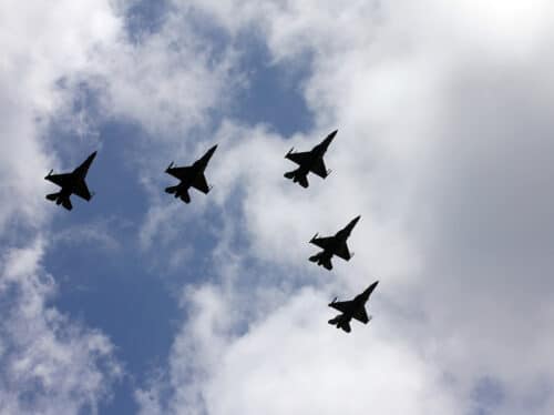 five jet fighters formation in the sky