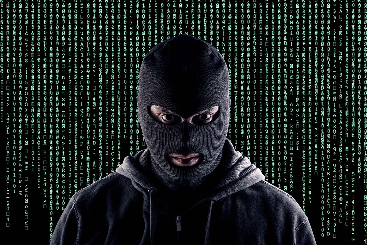 masked terrorist with matrix background (green letter figures)