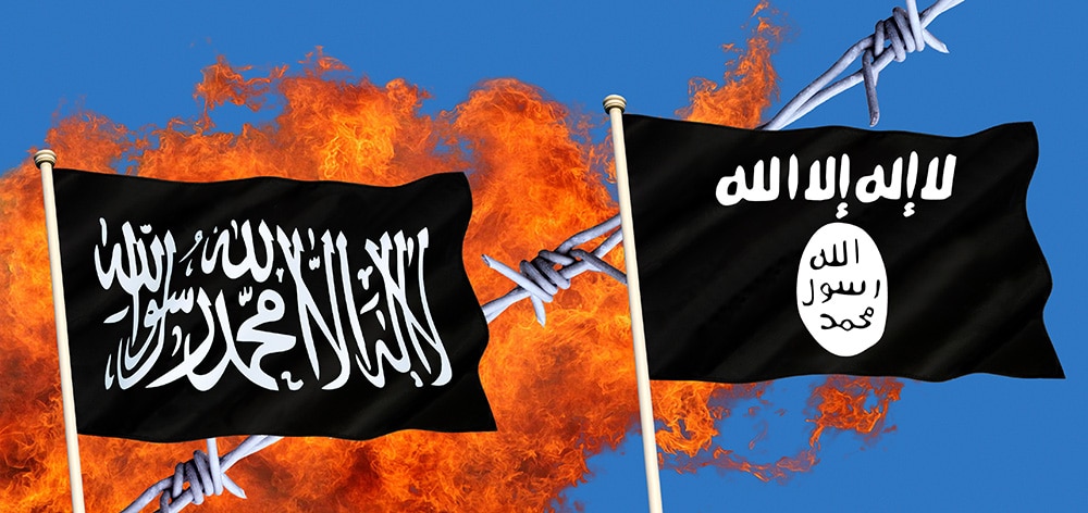 ISIS flags with fire & barbed wire in background