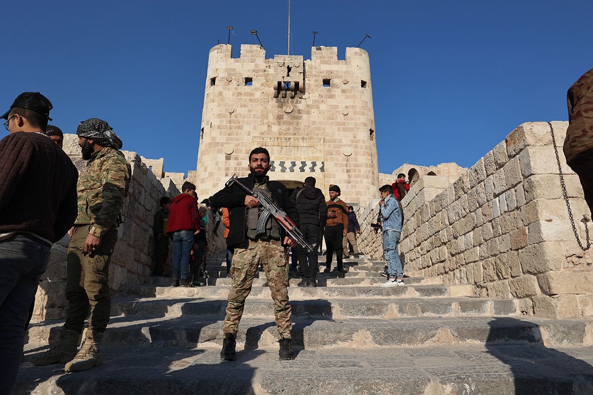 syrian rebel on staris to syrian old citadel