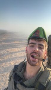 Ido Samiach in uniform with cigar