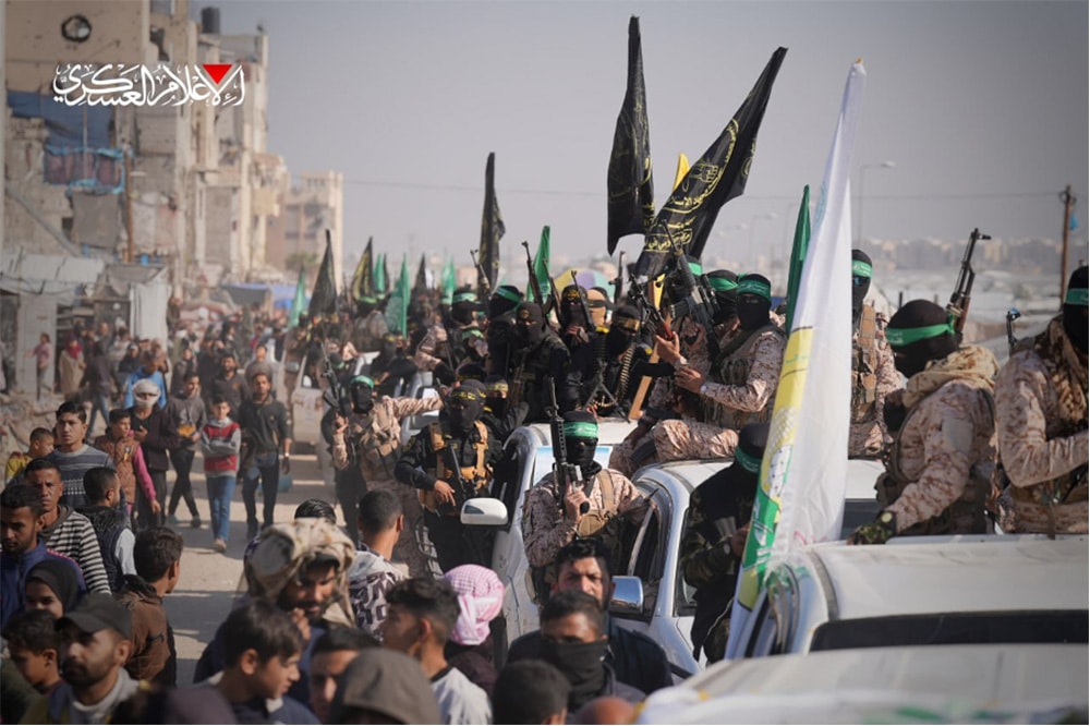 Hamas’s convoy with flags & weapons